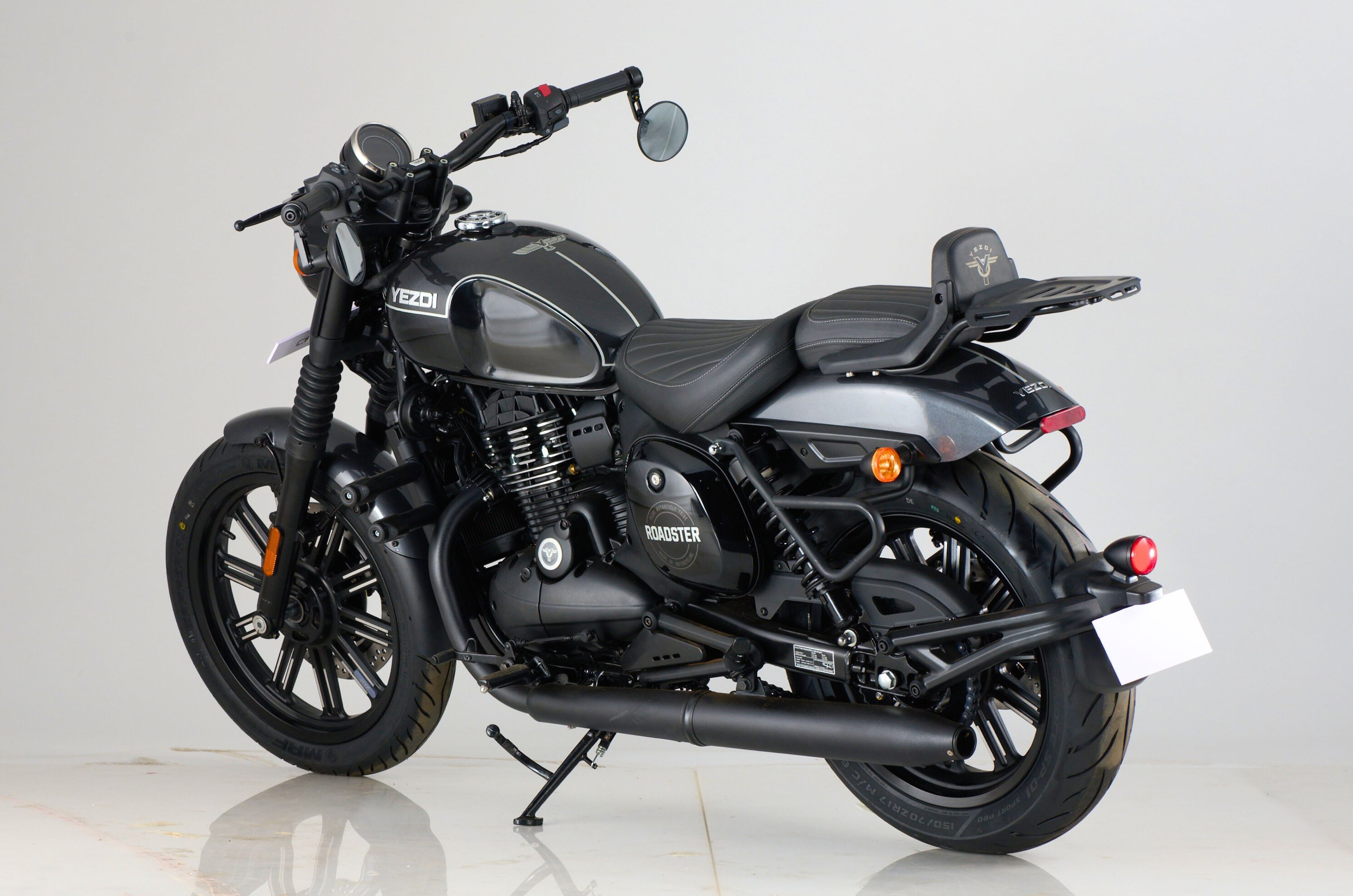 It now sports a chopped rear fender and a swingarm-mounted rear number plate holder